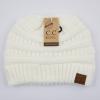 imageCC Exclusives Soft Stretch Cable Knit Messy Bun Ponytail Beanie Winter Hat for Women MB20AIvory